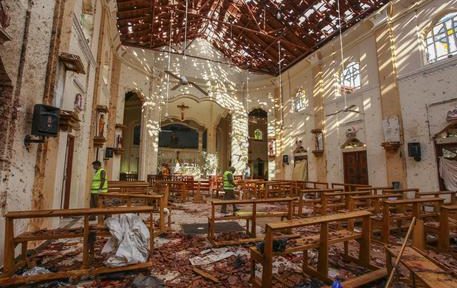 A view of St. Sebastian's Church damaged in blast in Negombo, north of Colombo, Sri Lanka, Sunday, April 21, 2019. More than hundred were killed and hundreds more hospitalized with injuries from eight blasts that rocked churches and hotels in and just outside of Sri Lanka's capital on Easter Sunday, officials said, the worst violence to hit the South Asian country since its civil war ended a decade ago. (ANSA/AP Photo/Chamila Karunarathne) [CopyrightNotice: Copyright 2019 The Associated Press. All rights reserved.]