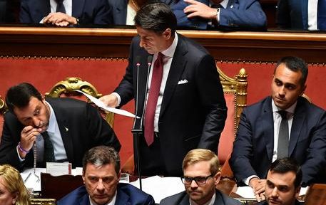 Italian Prime Minister Giuseppe Conte (C) is flanked by Deputy Prime Ministers Matteo Salvini (L) and Luigi Di Maio (R) as he addresses to the Senate about the government crisis, in Rome, Italy, 20 August 2019. ANSA/ ETTORE FERRARI