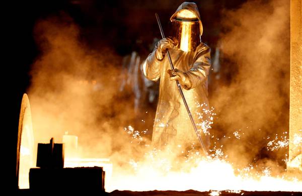 epa07760428 (FILE) - A steel worker takes a steel sample at blast furnace 8 of German corporation ThyssenKrupp in Duisburg, Germany, 07 April 2017 (reissued 07 August 2019). The German statistics bureau DESTATIS on 07 August 2019 state June 2019, production in industry excluding energy and construction was down by 1.8 per cent, when compared with 5.2 per cent in June 2018. The production of consumer goods showed a decrease by 1.4 per cent. Outside industry, energy production was down by 1.6 per cent in June 2019 and the production in construction increased by 0.3 per cent. Analysts say the decline may continue due to ongoing trade dispute between USA and China, both important for German exports.  EPA/FRIEDEMANN VOGEL
